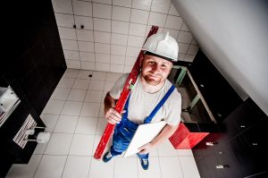 Tradesperson working with tile