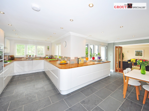 Kitchen with freshly installed grout between tiles, showcasing professional Grout Installation for a clean, finished look